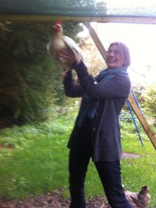 hold a chicken in the air